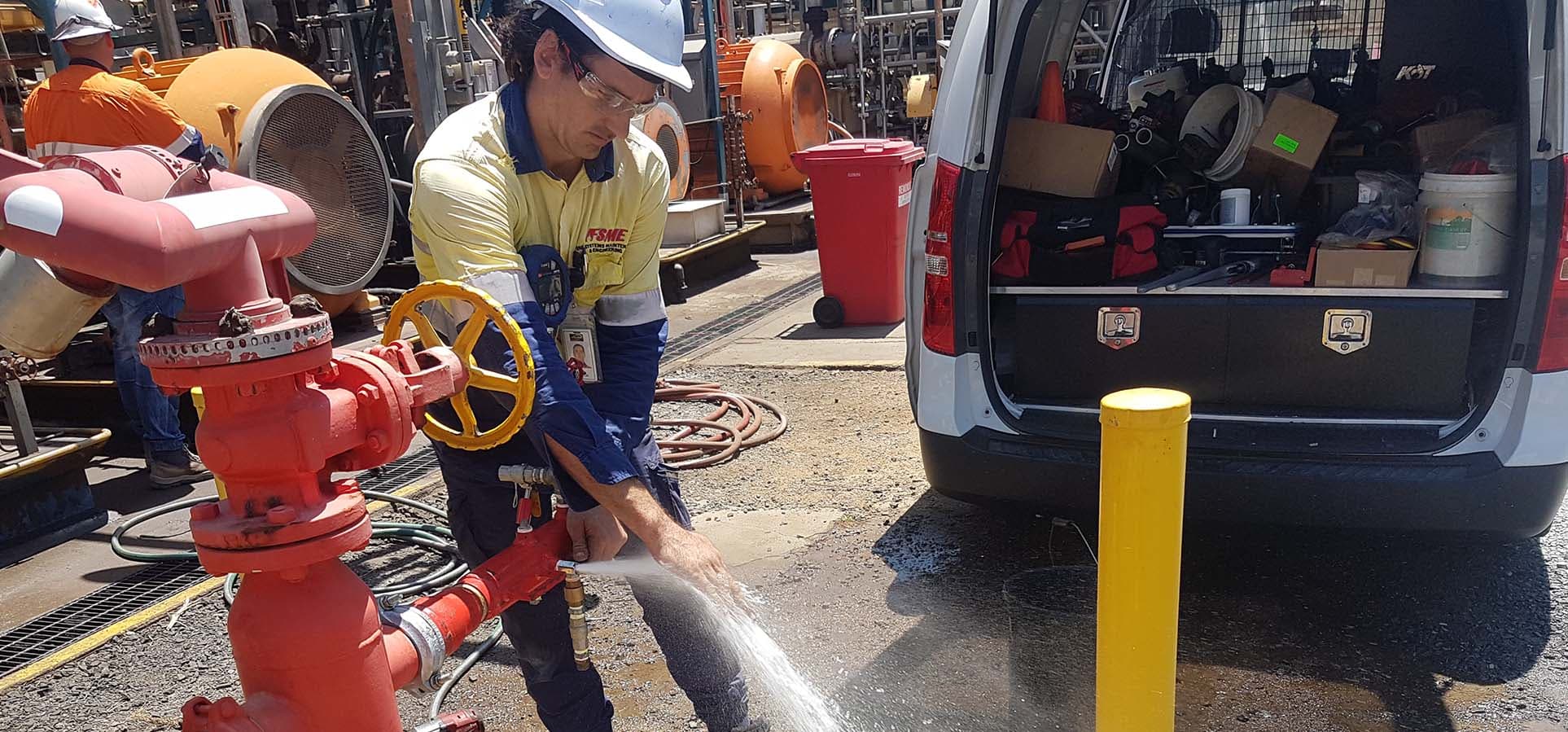 FSME fire protection technicians servicing fire systems on-site in South East Queensland